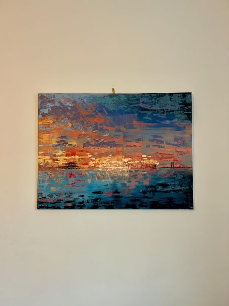 Large Abstract Canvas Painting -The Last Light of the Pier – 60 x 80 cm Abstract painting of a vibrant sunset over water with blue and orange hues.